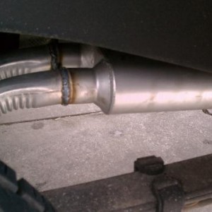The pipes are angled out about 45° to the side of the truck