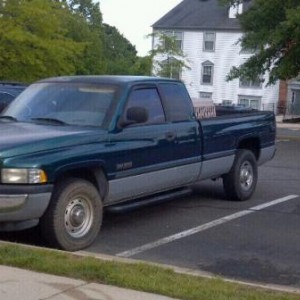 The truck, complete with spare tire installed and a bad paint job lol.