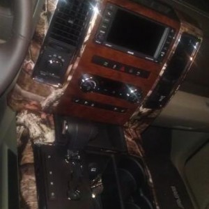 Mossy Oak vinyl wrap on the center console. So much better than the silver.
