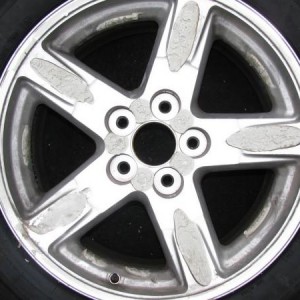 Found this pic of a 4th gen 20" chrome cladded wheel with the cladding removed