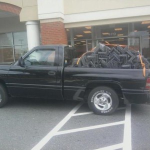 this was our 1999 dodge ram 1500 sport 2wd 318 magnum she was called "******" here she is with 2,222 pounds of steel in her 6 ft bed. Look close at th