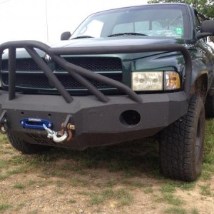 Iron bull front bumper with a super winch installed