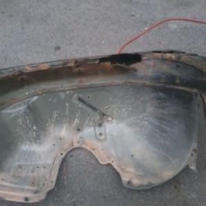 the old, rust free drivers side fender