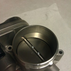 Here is a good view of the stock tb, you can see it is dirty with a bunch more material inside.