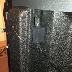 I redneck shrink wrapped (electrical tape) the control box and attached to the back of the bed pillar with twomsidednautomotive tape