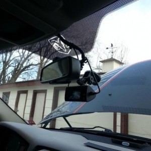 Dual camera DVR/dashcam. Touch screen. Records out the windshield and back into the cab (with night vision). Has GPS sensor for speed and a G sensor f