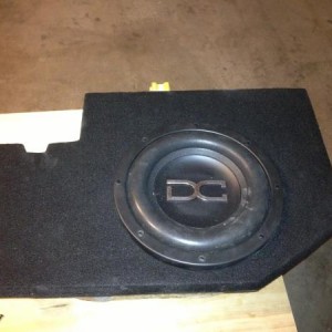 Carpeted driver side enclosure.