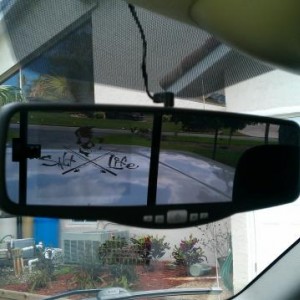 my rear view mirror/back up camera. if you look closely, to the left of it there is a screen the will shine through the mirror to provide a back up ca