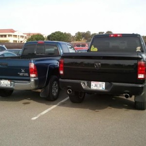 leveled next to a stock tacoma