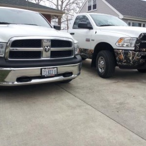 My truck(left) and My dad's 2012 Ram 2500 4x4 5.7 hemi (right)