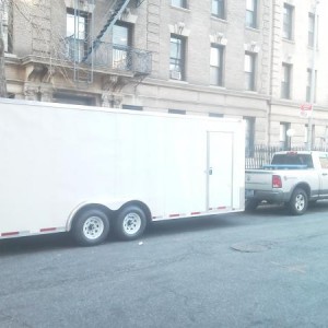 With the race car trailer.