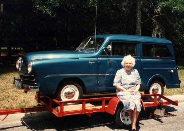 1950 Crosley my mother sitting on trailer, what my dad toyed with.