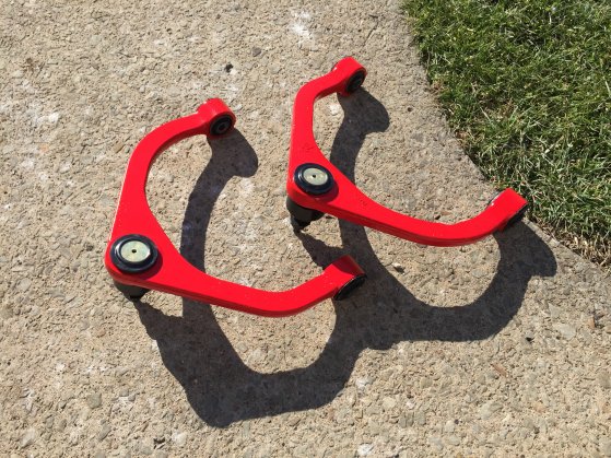 24 - Painted Mevotech UCA's ready for install.