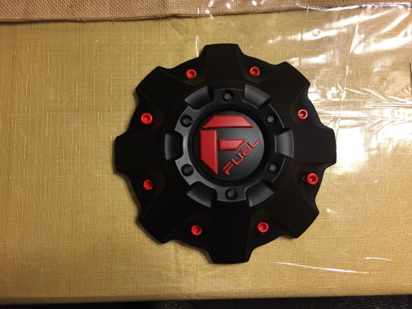 32 - Custom painted the bolt covers for the new wheels.