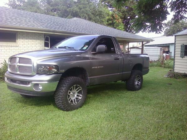 5.7 hemi...cold airn intake w/ throttle body spacer....flowmaster dual exhaust....17" eagle black and chrome rims w/ 33" mickey thompson mtz..and leve