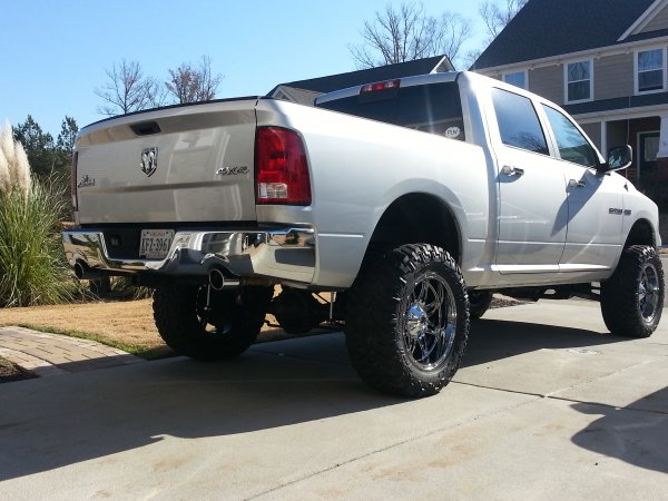 6" Zone Suspension Lift.  20x10 -24 offset Chrome PVD Fuel Hostage wheels wrapped in 35x12.50 Nitto Trail Grapplers