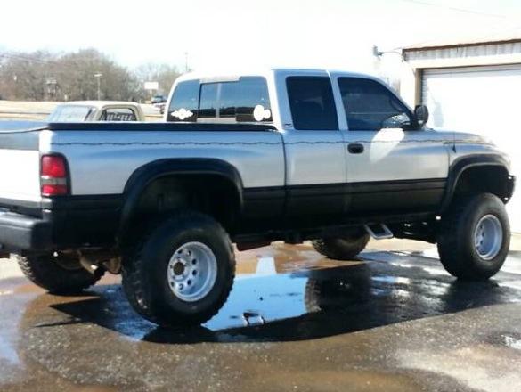99 dodge ram 1500 5.2 V8 over 6" lift sitting on 36"s