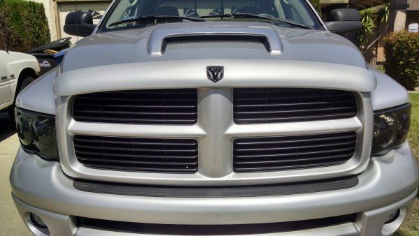 Blacked out the grill. Looks good until I can afford a black billet grill.