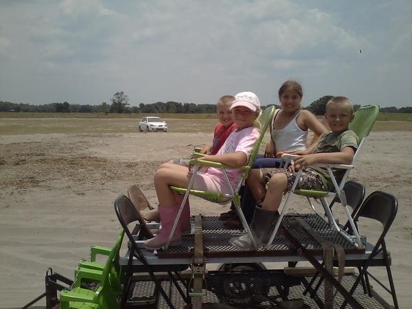 Coyote fun ride for the kids I made took to the mud hole (like a park) pulled it with my Honda that I traded.