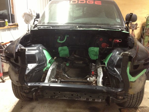 Engine bay being prepped for paint