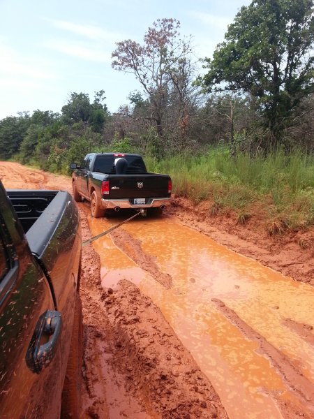 Got stuck in the mud, there was a 2ft tall rock in front of the pass tire.