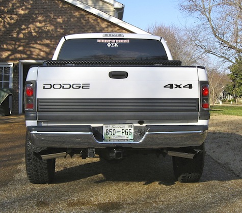 Had the exhaust angled out the back and had bigger tips installed.
