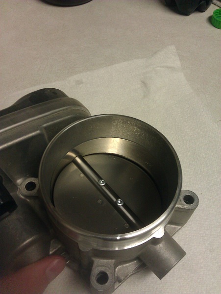 Here is a good view of the stock tb, you can see it is dirty with a bunch more material inside.