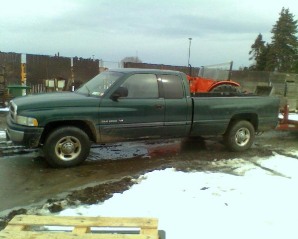 I learned how to bando and paint on this truck , i droped the tractor bucket on the driver side of the bed !!