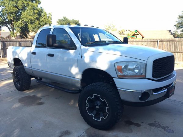 I purchased this truck in 2010, completely stock.  I added things over time and eventually put the Fabtech lift on it with 35" tires.  In 2013, I part