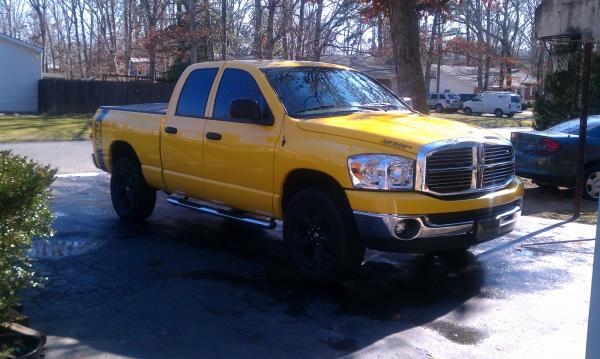 Just washed, with the wife' s Stratus in background.