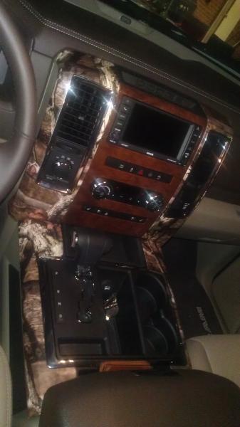 Mossy Oak vinyl wrap on the center console. So much better than the silver.