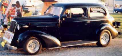 My dad's 1937 Chevy 2-door sedan. Miss it.