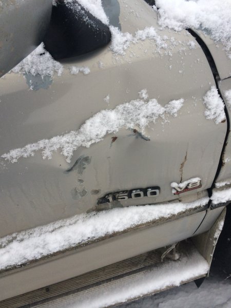 Passenger door ding