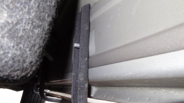 Passenger Side, rear mid bracket attachment