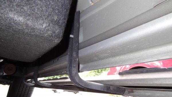 Passenger Side, rear mid bracket attachment