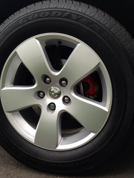 Red calipers with silver brackets