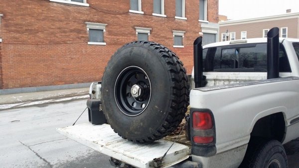 Refinished the wheels myself and started mounting the tires.