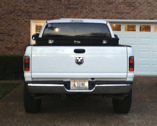 Removed the old tail gate decals and added the new Dodge Ram tailgate emblem.