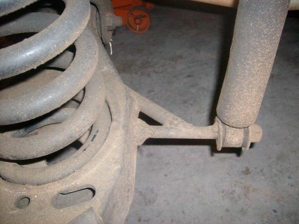 Shock relocated for previous air bags. Go the new bags and brackets getting ready to redo front suspinsion .