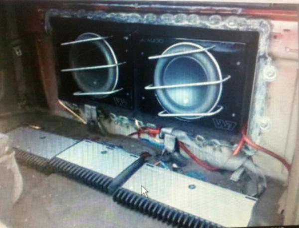 Subsnamps tucked away behind and below rear seat. A steel welded housing holds the 2 W7's and keeps them safe.