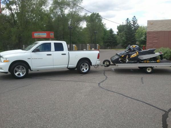 The 12' hooked to the '09 Doo MXZ and '95 Cat EXT