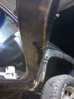 the old passenger side door, which was replaced with a friends used rust and dent free door