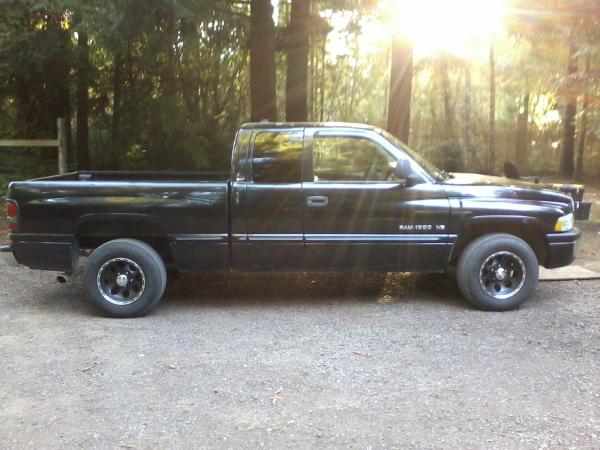 The side veiw of my 99 Dodge Ram 1500 with my new Eagle Alloy wheels.