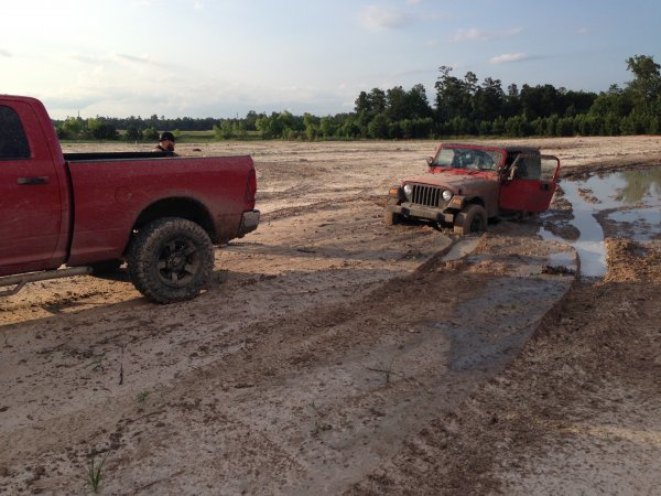 this poor little jeep tried to follow bent his bumper pulling him out