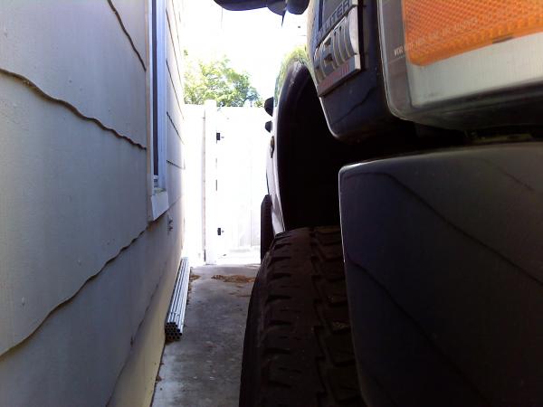 Tire Width 
(The front tire is slightly turned so it looks like it normally sits further out than it really does. If I had noticed this when I took t