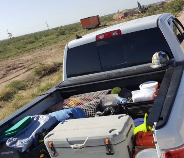 Truck loaded down with work crap