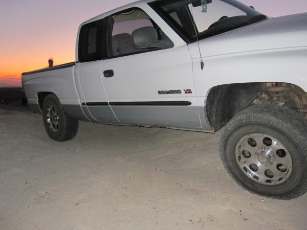 Tuckin it in.