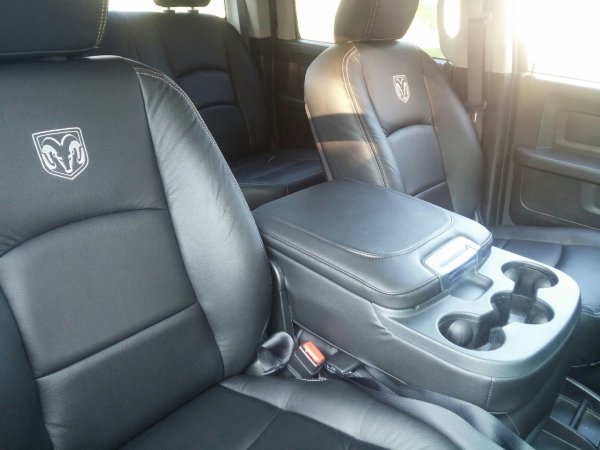 U-connect 5.0, backup camera, CD player under console and giant cup holders.