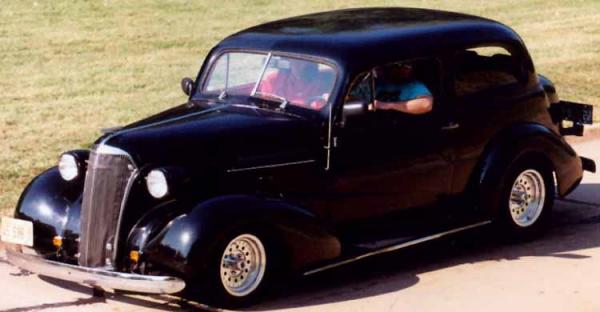Us in dad's 1937 Chevy pulling into Vintage Rodders BlackHawk carshow in Moline Illinois.